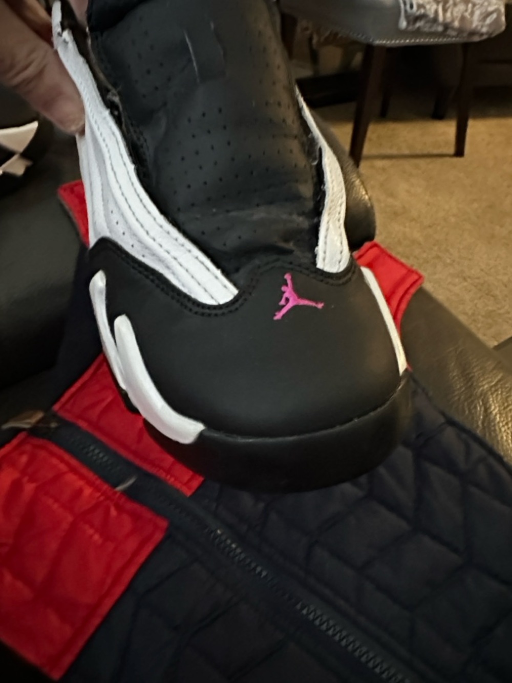 Jordan Black and White Basketball Shoe with Pink Accents